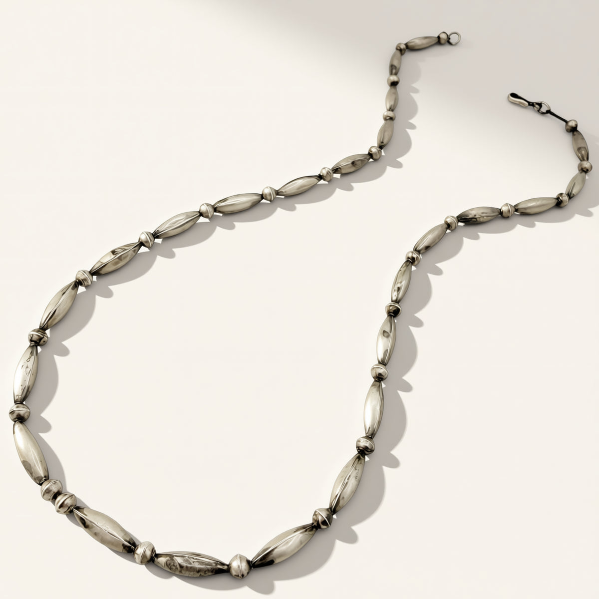 Silver necklace on a white background