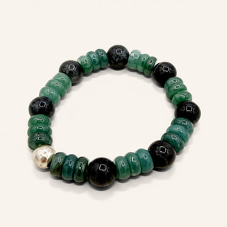 Green and black beaded bracelet on a white background