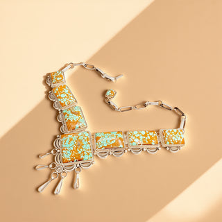 Decorative necklace with marble patterns on a beige background