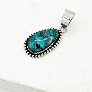 Rare Leslie Nez Bisbee Turquoise Pendants