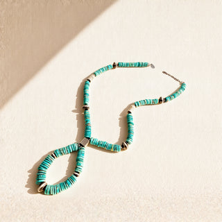 Turquoise necklace on a beige background