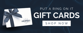 Hespera gift card with blue bow on a dark background