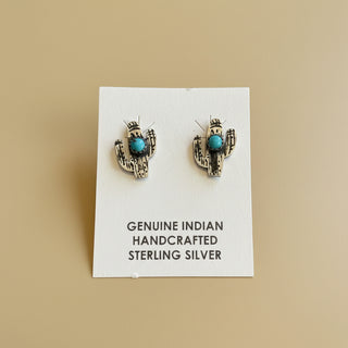 Cactus earrings on a white card that reads "Genuine Indian Handcrafted Sterling Silver"