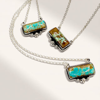 turquoise necklaces on a beige background