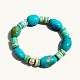 Turquoise beaded bracelet on a white background