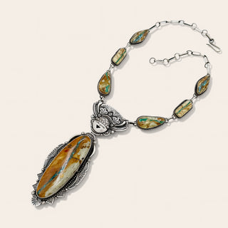 Necklace with large stone pendants on a white background