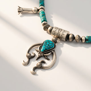 turquoise necklace on a beige background