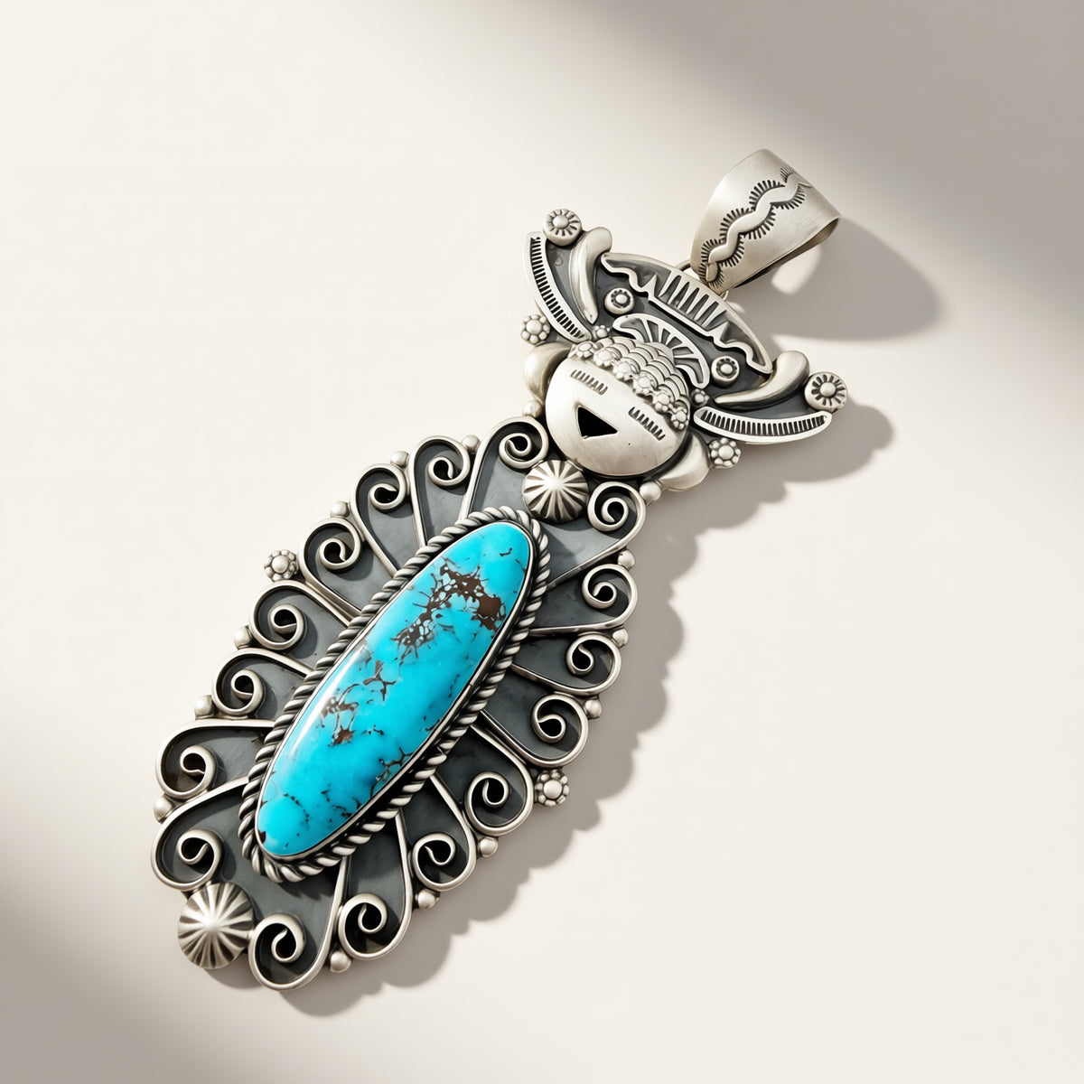 silver maiden pendant with oval turquoise stone on a beige background