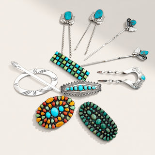A set of Southwestern-style silver accessories and brooches, including pins, hair sticks, and a hair comb, decorated with turquoise, coral, and green stones on a light beige background.